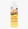 Bottle of MannaPro Egg Cleanser with a yellow label on a white background