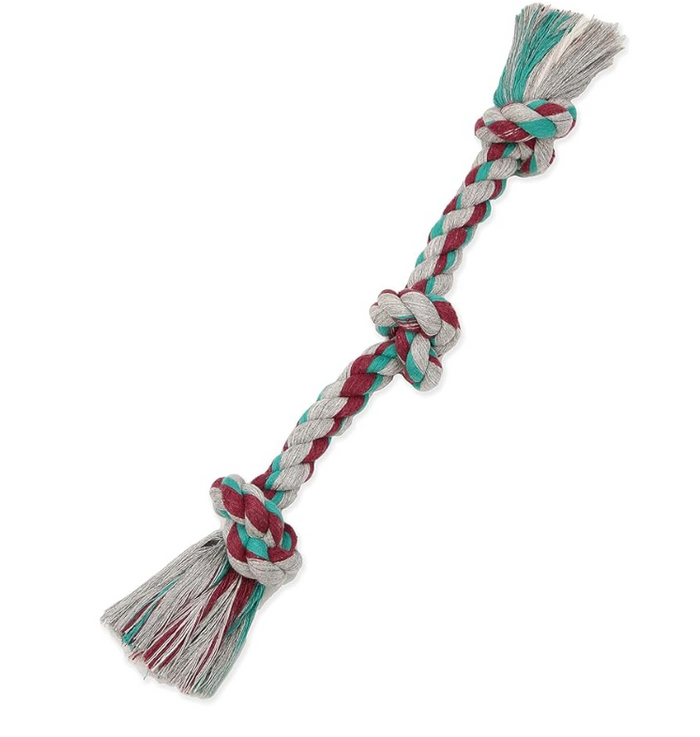 Multicolored braided rope toy on a white background