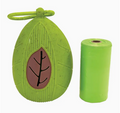 Green leaf-shaped container with a brown leaf design on a white background